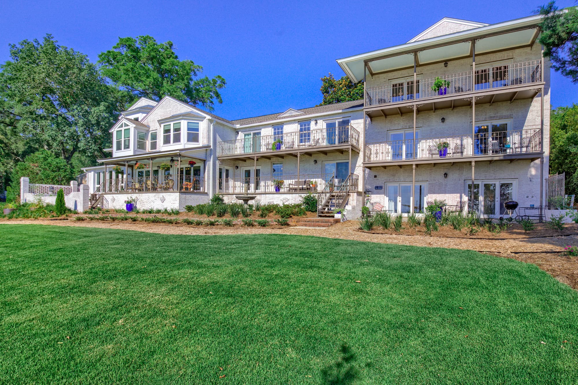 Exterior view of Jubilee Suites with balconies and entrances to guest suites